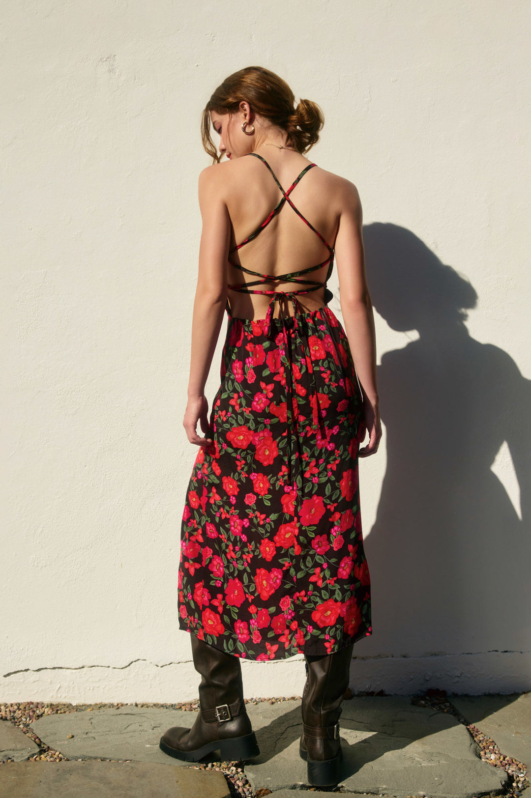 Stylish Soraya Printed Floral Maxi Dress features a bold red floral design, perfect for making a statement anywhere.