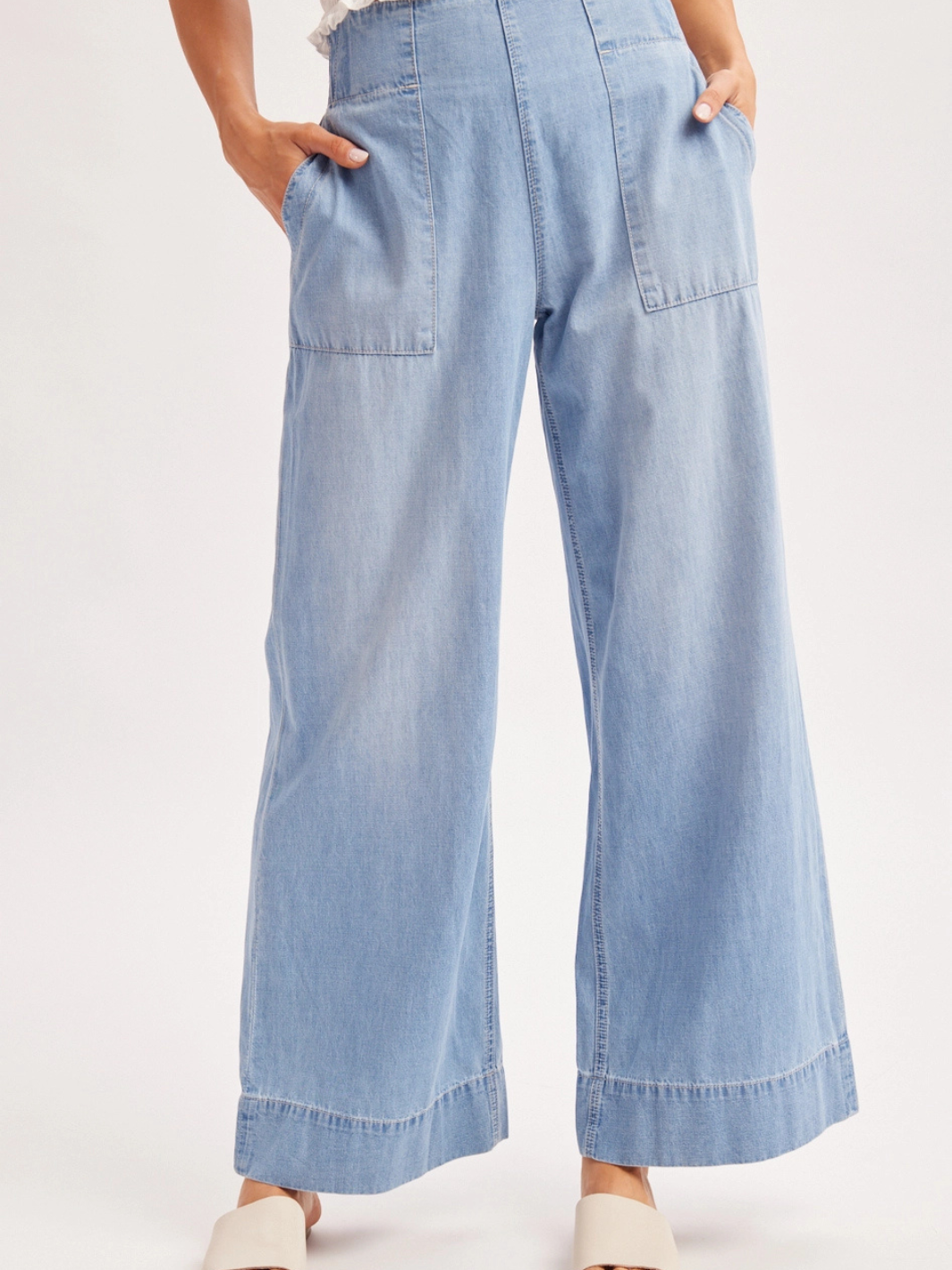 The Sailor Wide-Leg Denim Trouser in light wash with sailor-inspired, relaxed silhouette and patch pockets.