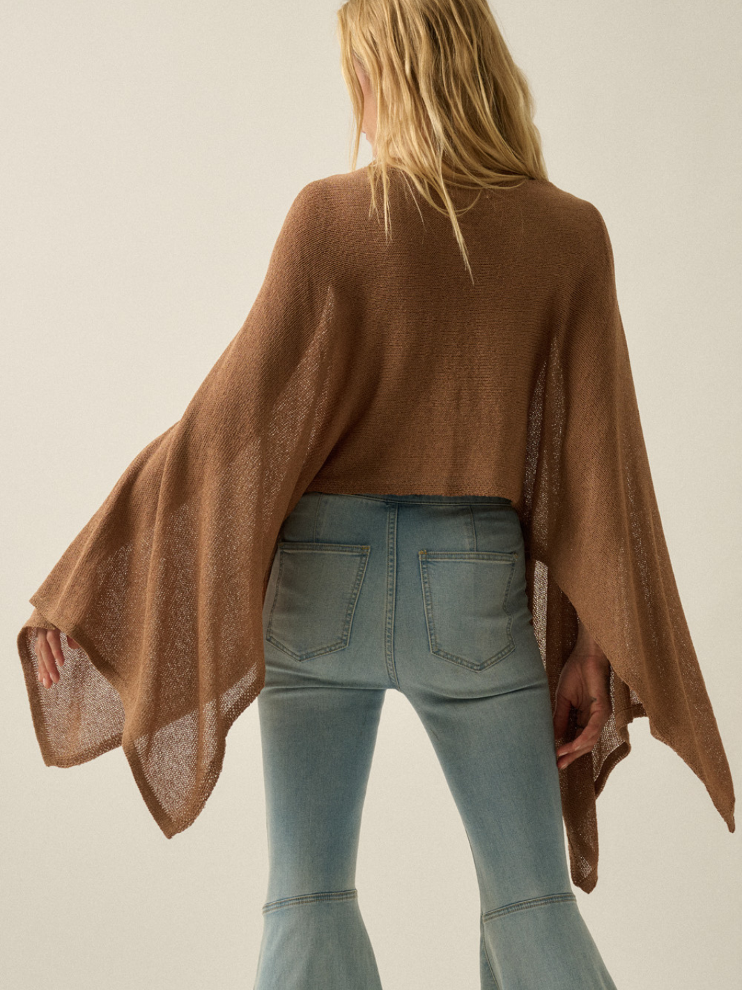 Daydrift sheer knit poncho sweater in brown, oversized and free-flowing with airy drape.