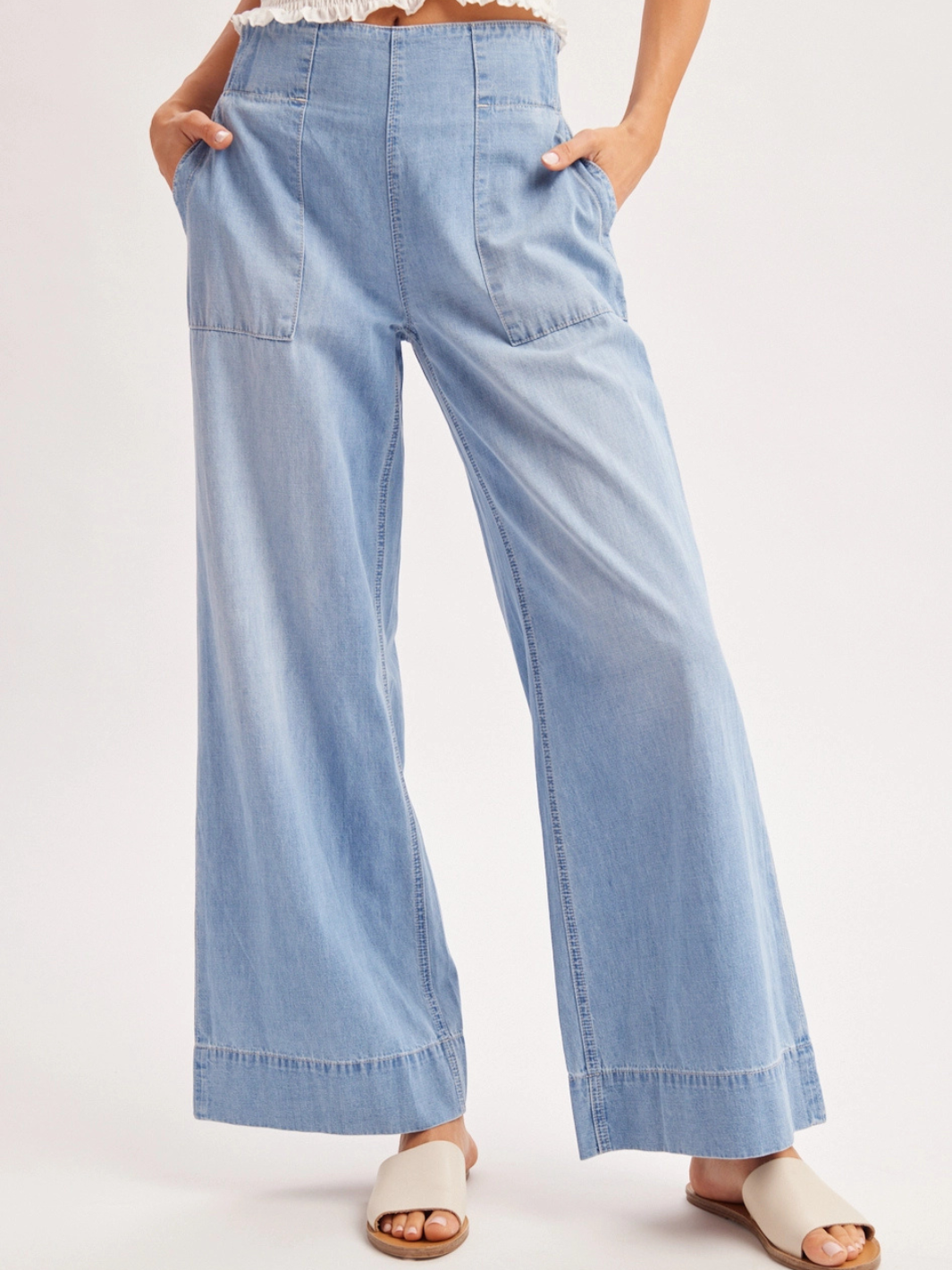 The Sailor Wide-Leg Denim Trouser in vintage-wash denim with a sailor-inspired, relaxed wide-leg silhouette.