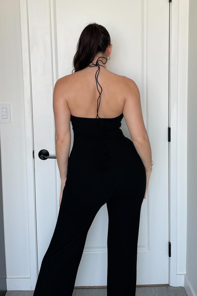 Be bold and beautiful in the ERIKA WOVEN CUTOUT JUMPSUIT - BLACK! Featuring a low cut cutout detail neckline, this jumpsuit offers a daring design with a tie halter for added comfort and an eye-catching woven texture. Step out in style this season!