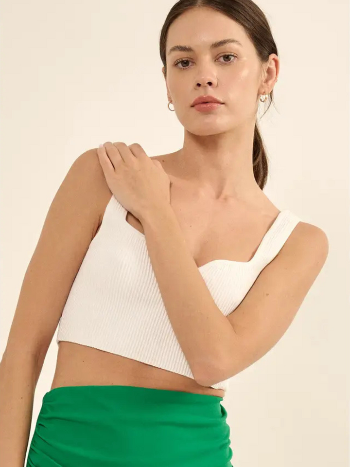 Stylish model showcases the Taylor Ribbed Square Neck Crop Top, featuring a sleek cutout design and body-hugging fit.