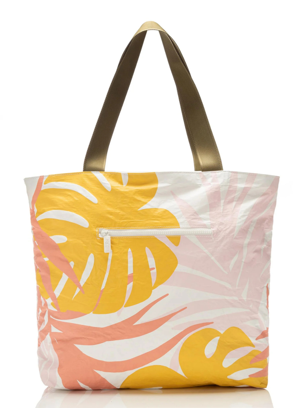 ALOHA Collection Tropics tote with Starburst Tropics print, yellow palm leaves on pink background, bronze handles.
