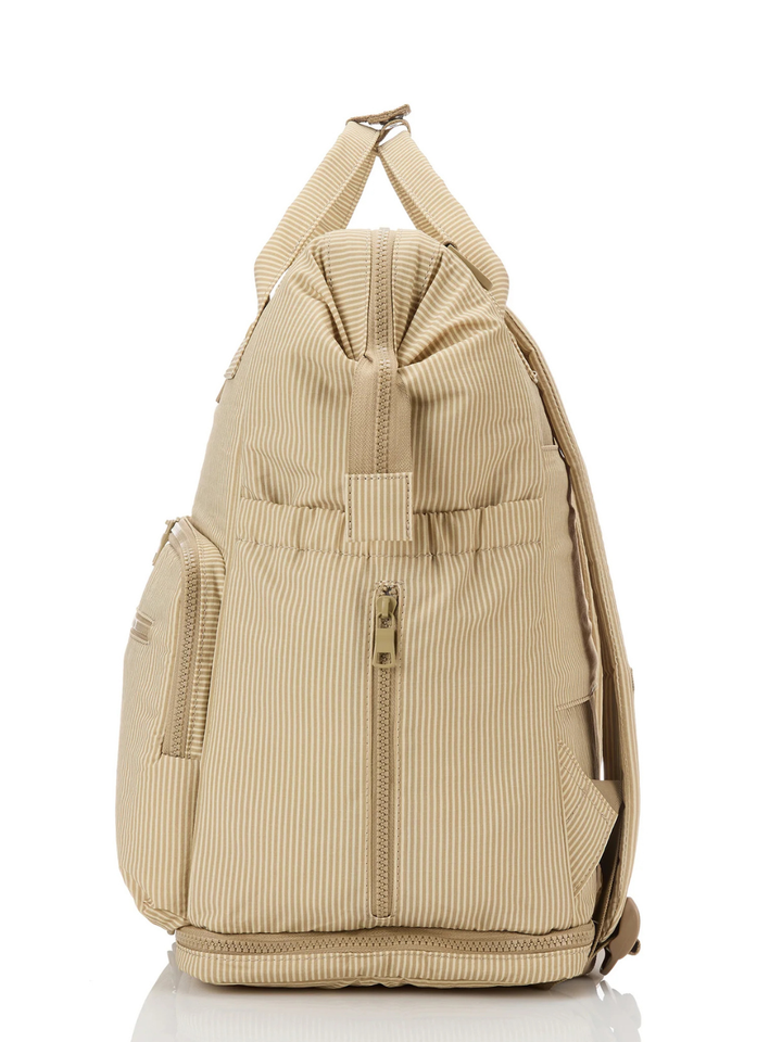 Le Bébé diaper backpack in neutral beige stripes from the ALOHA Collection, with multiple compartments and a top handle.