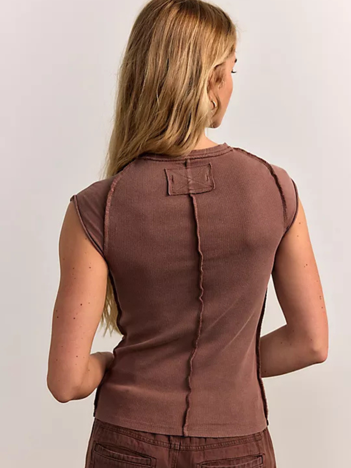 Back view of Ever Had Tee in dusty-rose ribbed knit, center seam and small upper-back patch.