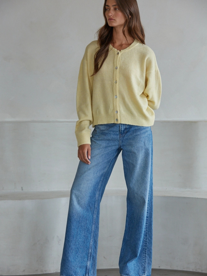 Sunday Soft Button-Front Knit Cardigan in pale yellow, cropped relaxed fit with pearl buttons.