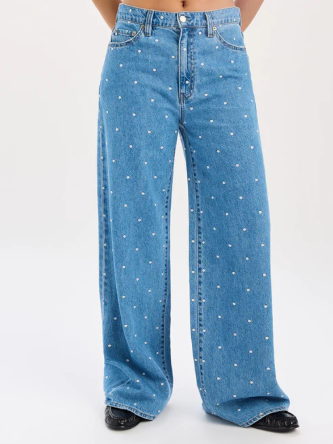Daze Denim The Wanderer Mid-Rise Palazzo Jeans in blue denim with white polka dots, relaxed waist, wide-leg silhouette.