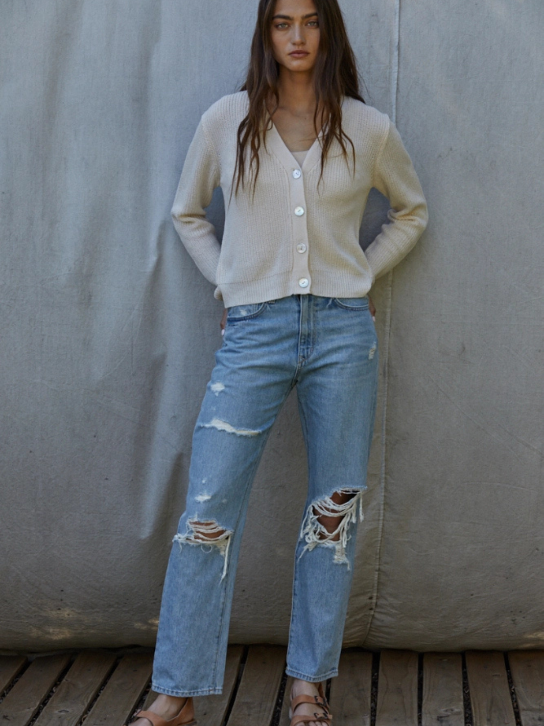 Golden Hour V-Neck Button-Front Knit Cardigan relaxed cropped open-knit with large buttons worn over distressed denim.