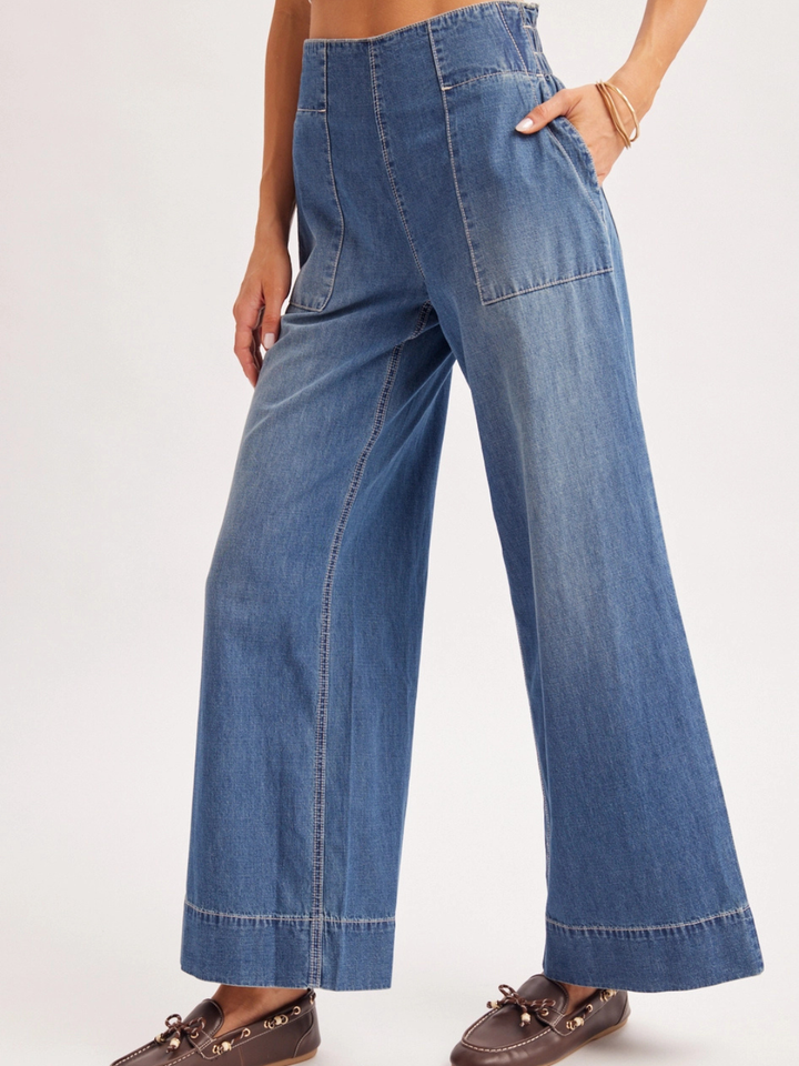 The Sailor Wide-Leg Denim Trouser on a model with a relaxed, wide-leg silhouette and vintage-washed finish.