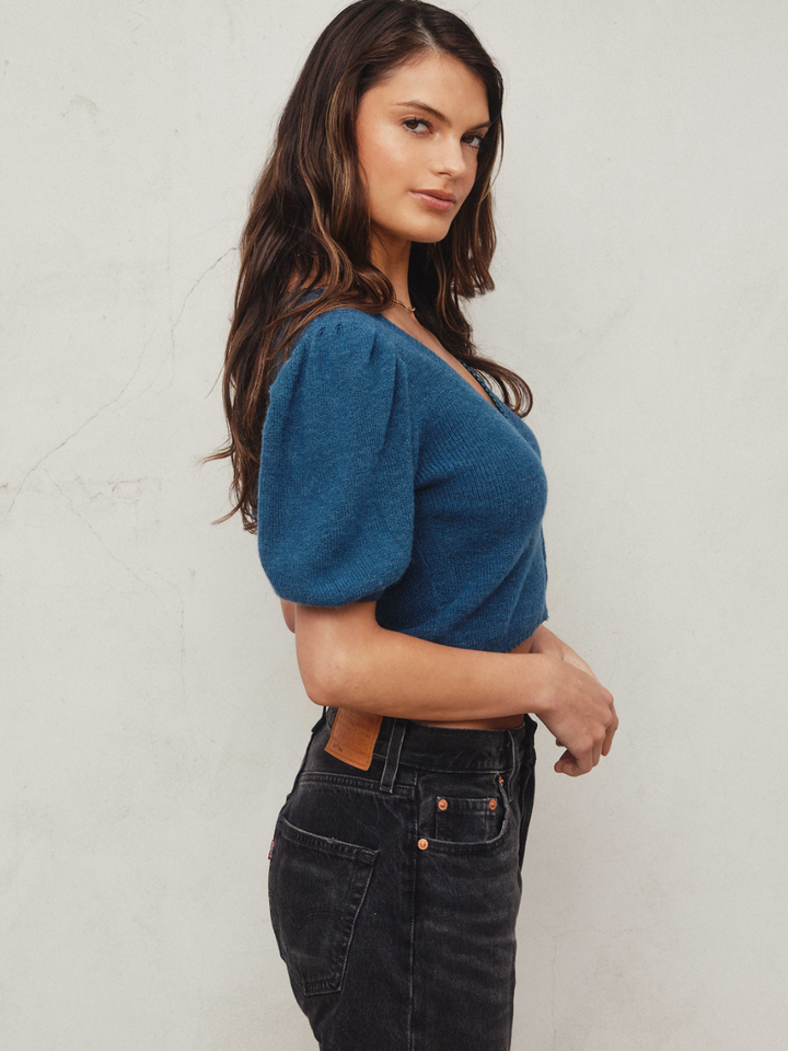 Simply Yours V-Neck Cardigan features puff sleeves and a cozy V-neckline, perfect for layering in style.