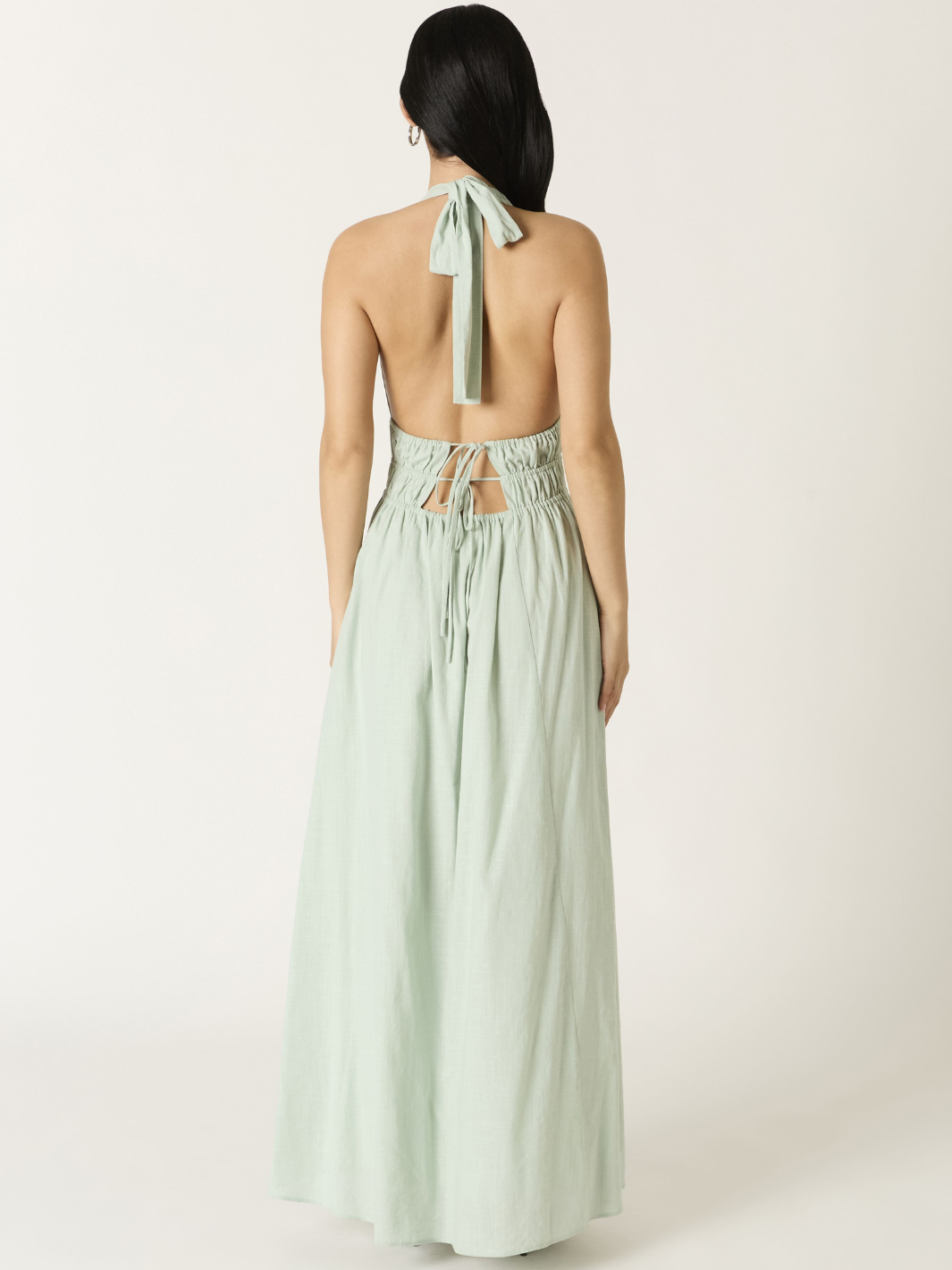 Back view of Soleil Plunge Halter Maxi Dress: mint, halter tie, open back, ruched waist, cutouts, flowing A-line skirt.