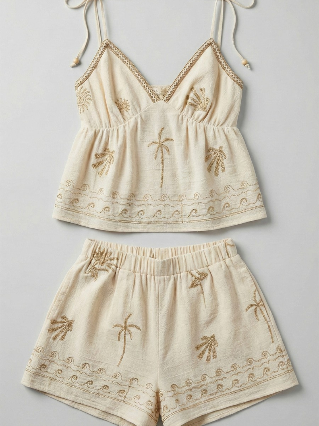 Palmetto Embroidered Pull-On Shorts and matching top in cream cotton with gold palm tree and wave embroidery.