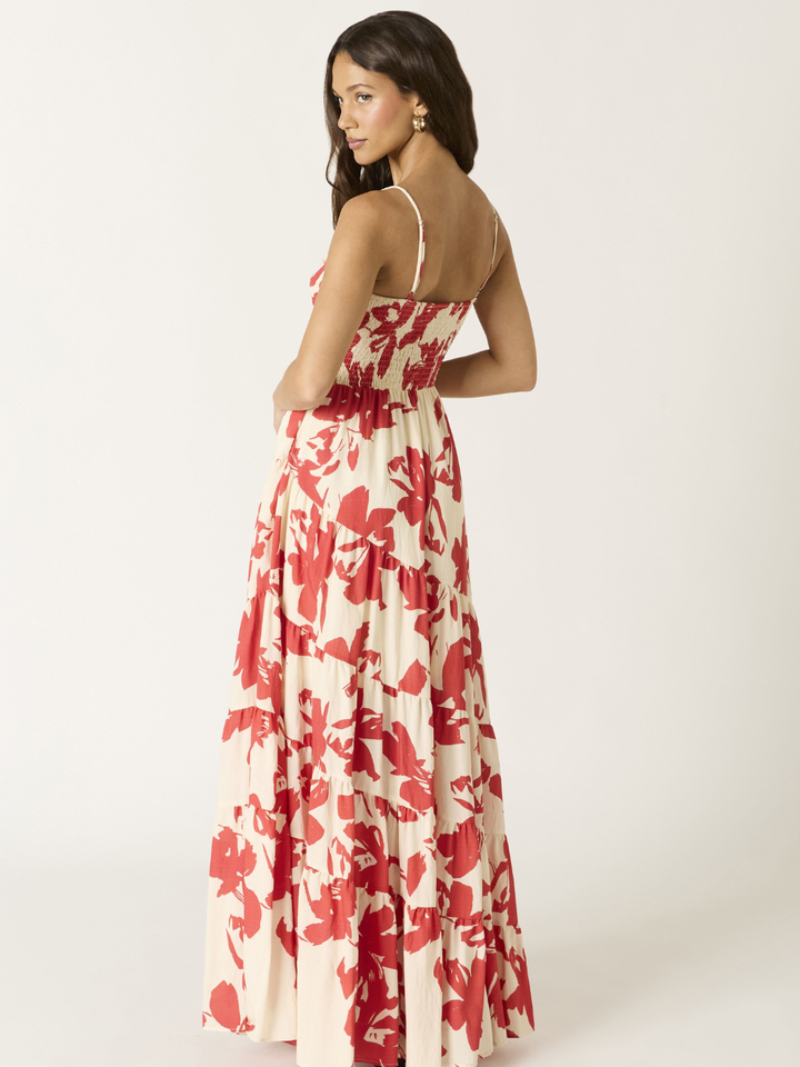 Crimson Bloom Tiered Maxi Dress, cream base with painterly red florals, spaghetti straps, tiered full-length skirt.