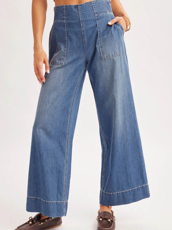 The Sailor Wide-Leg Denim Trouser in vintage wash with sailor-inspired, relaxed wide-leg silhouette and patch pockets.