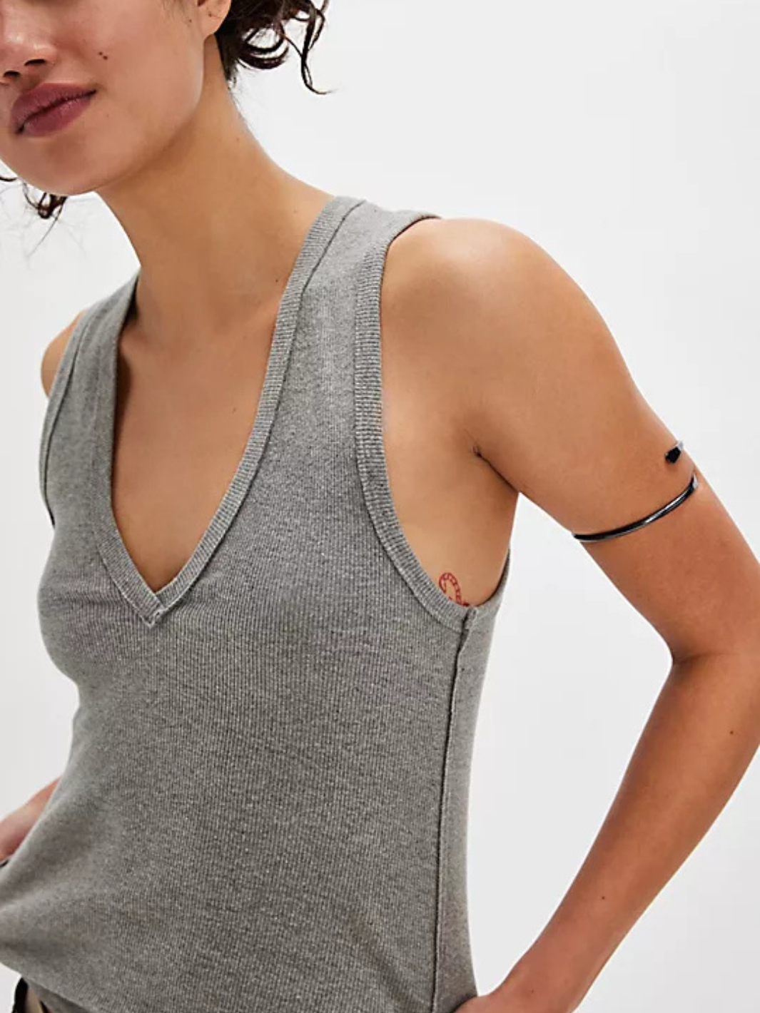 FREE PEOPLE Neria Tank Top in grey ribbed knit, V-neck, slim-fit on a model.