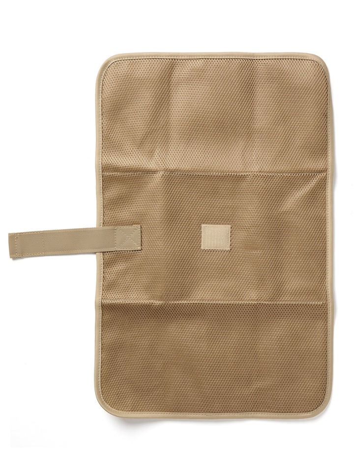 Interior organizer panel of ALOHA Collection Le Bébé Diaper Backpack in neutral beige with strap and pockets
