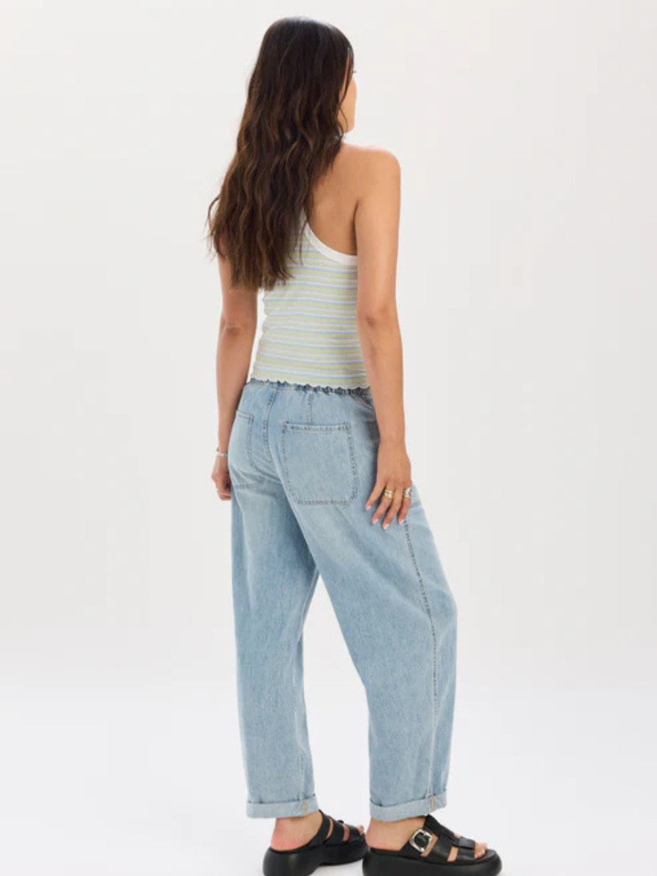 Daze Denim Villa Drawstring Barrel Leg Pant: relaxed, light-wash denim with drawstring waist and cuffed hem.