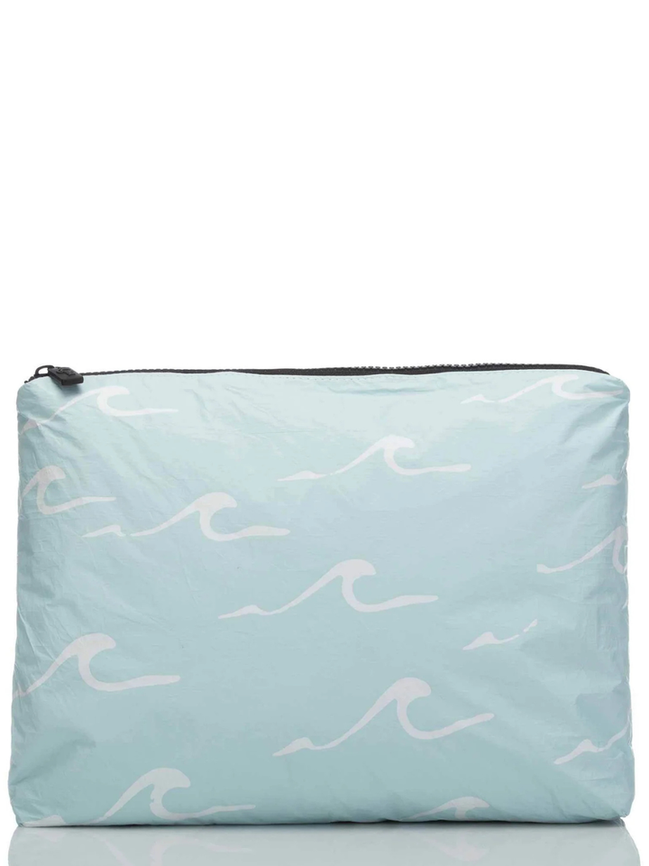 Light blue zip pouch with white wave pattern from ALOHA COLLECTION Seaside Bag Collection, Cardiff-inspired.