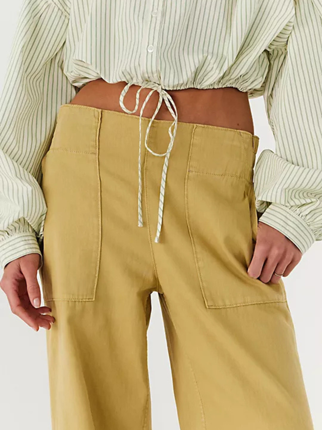 Free People We The Free breezy pull-on denim jeans, mid-rise tan with drawstring waist and patch pockets.
