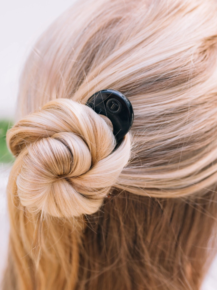 TELETIES French Hair Pin secures a polished blonde updo.