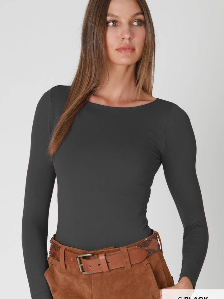 NikiBiki Margot Boat Neck Long Sleeve Top in Black — fitted boat neck top tucked into suede pants | Jayden P Boutique