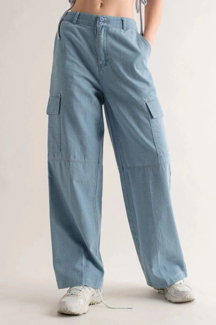 Our Eva Wide Fit Cargo Pants feature cargo pockets and an elastic back waist for a comfortable fit. Made with 95% cotton and 5% polyester, they provide superior breathability and comfort. These pants have a wide fit to ensure maximum freedom of movement.