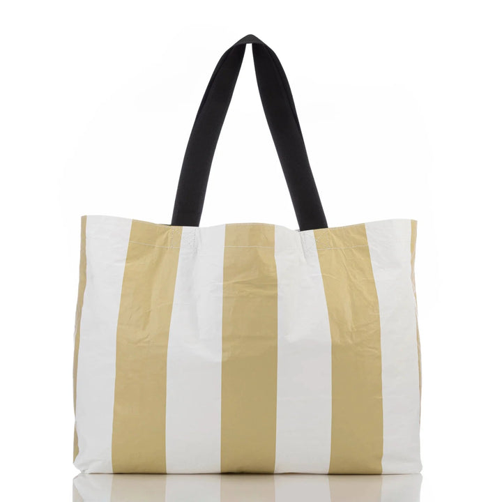 Aloha Collective Monstera - Seaweed tote with white and gold vertical stripes and black handles.