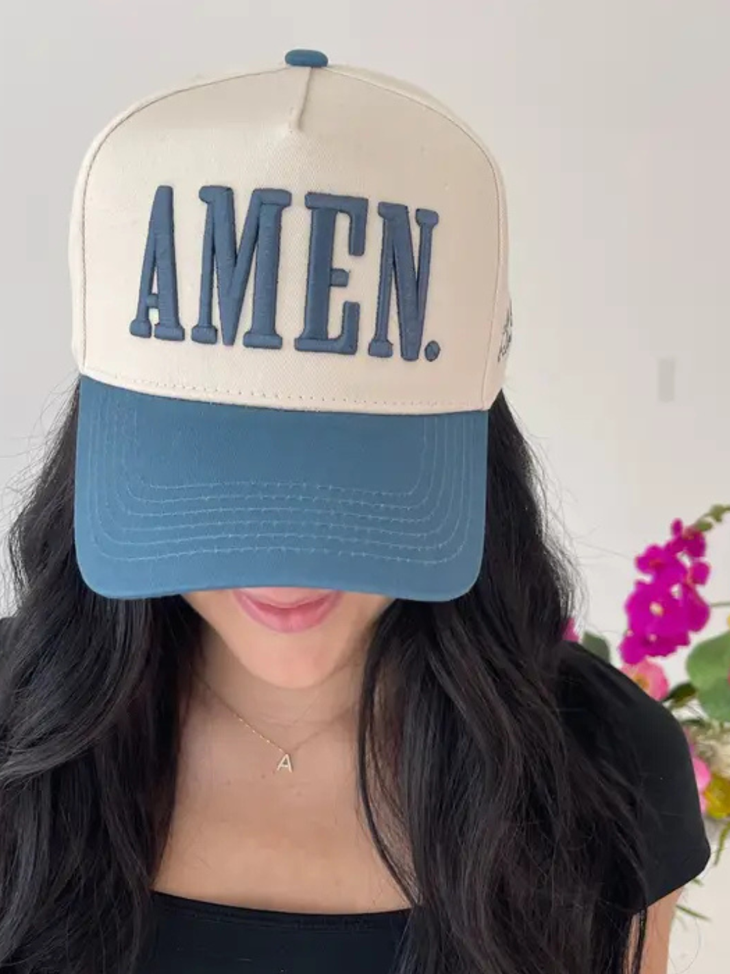 Cream crown, slate blue bill, AMEN. vintage trucker hat with 3D puff embroidery on front, worn by woman
