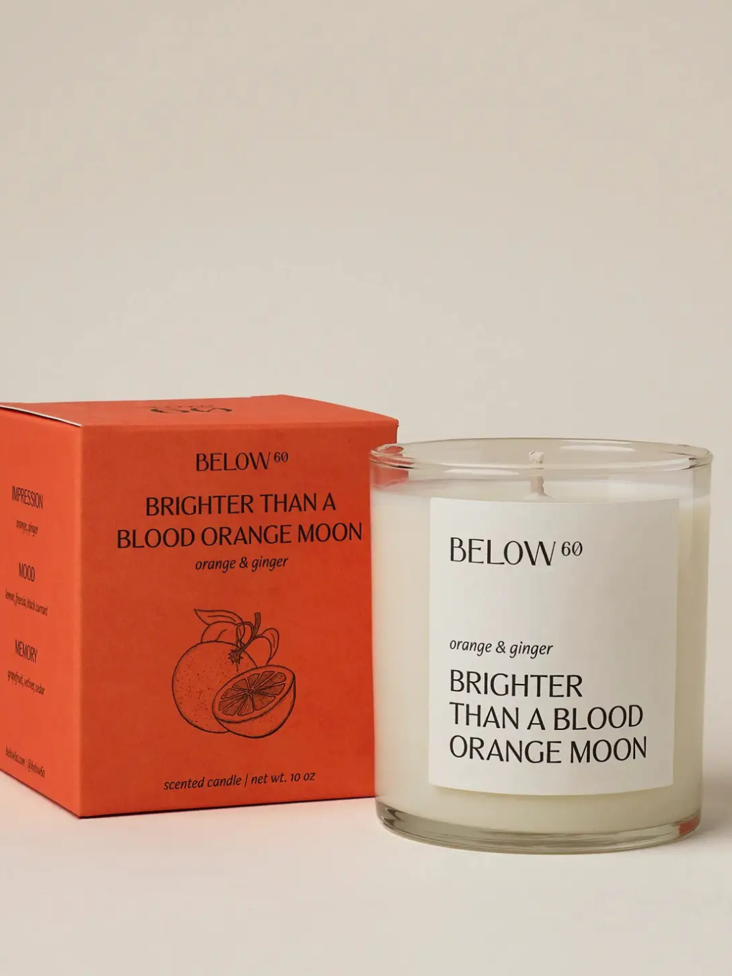 BELOW 60- Brighter Than A Blood Orange Moon candle by BELOW60 — orange & ginger with florals and black currant.