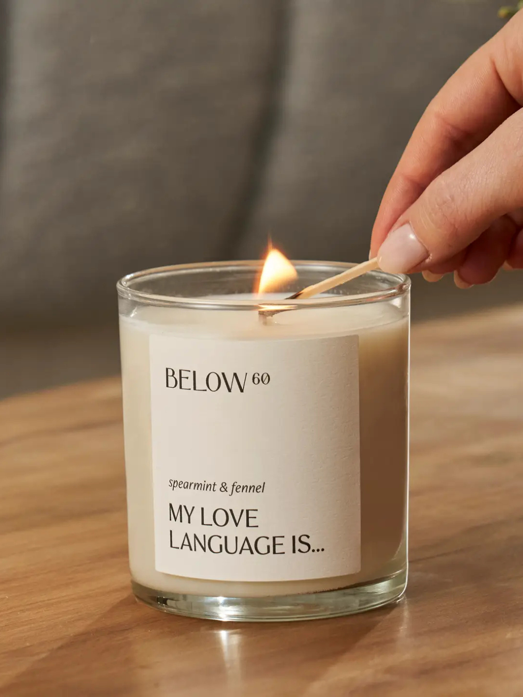 BELOW 60 | My Love Language Is ... candle by BELOW 60, spearmint & fennel, being lit.
