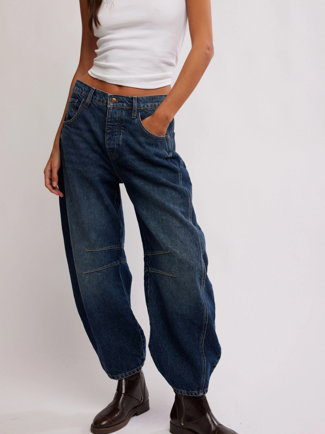 Elevate your casual wardrobe with these Lucky You Mid Rise Barrel Jeans. Featuring a barrel fit, front and back pockets, zipper fly, and a baggy fit, these jeans are ideal for stylish, relaxed looks. Their light wash makes them perfect for year-round wear.