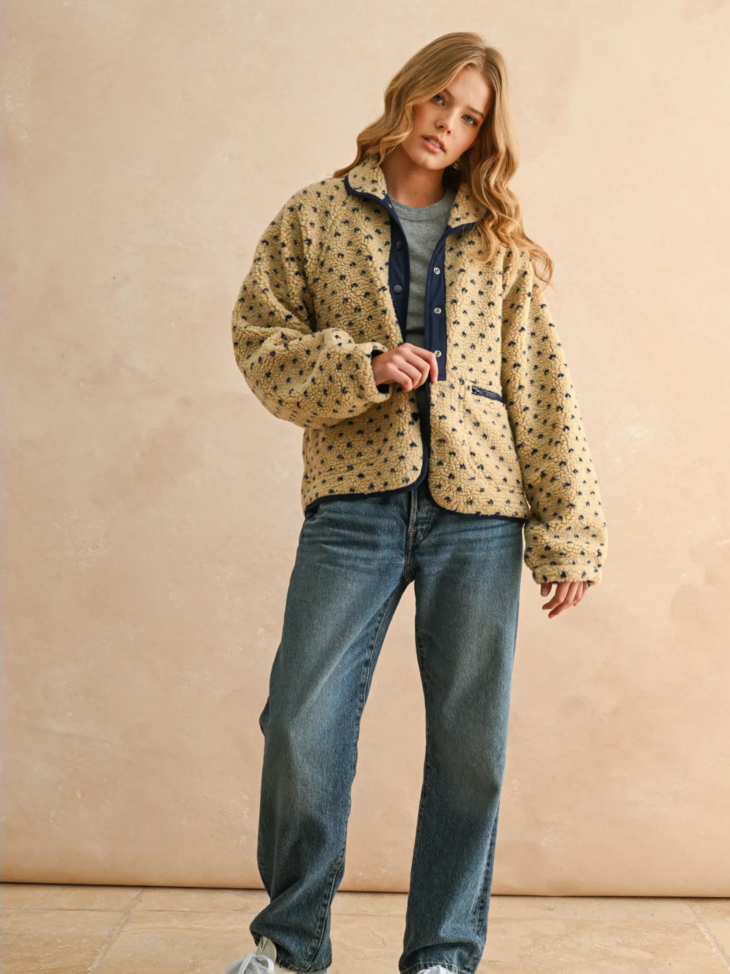 Canyon Bloom Patterned Sherpa Fleece Jacket in beige with navy trim, floral dot pattern; button-front with zip.