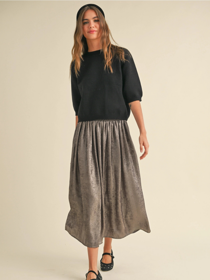 Cleo ribbed knit short-sleeve sweater top in black with a crew neck and softly structured silhouette.