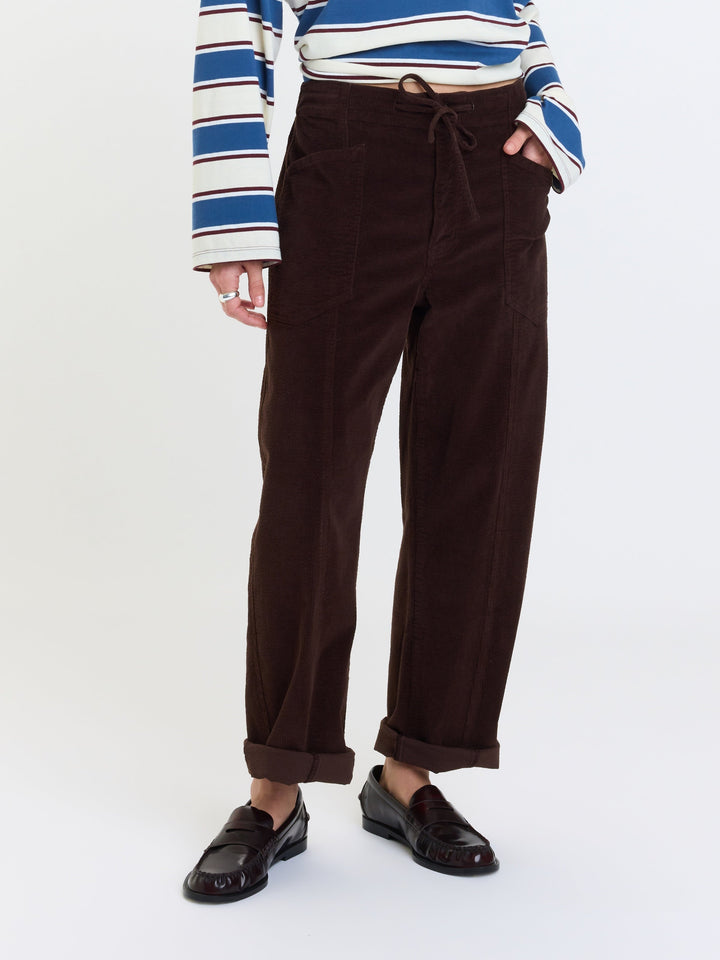 Daze Denim Villa Corduroy Barrel Pants in Chocolate — close-up of cuffed tapered leg with black loafers | Jayden P Boutique
