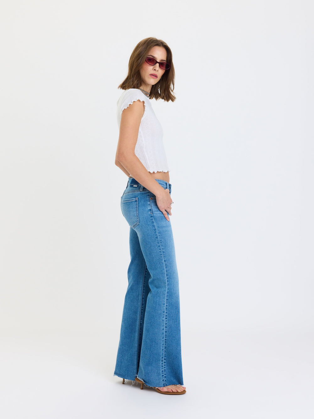 Daze Denim The Lowkey Low-Rise Flare Jeans in First Crush — Raw Scissor-Cut Hem Detail | Jayden P Boutique