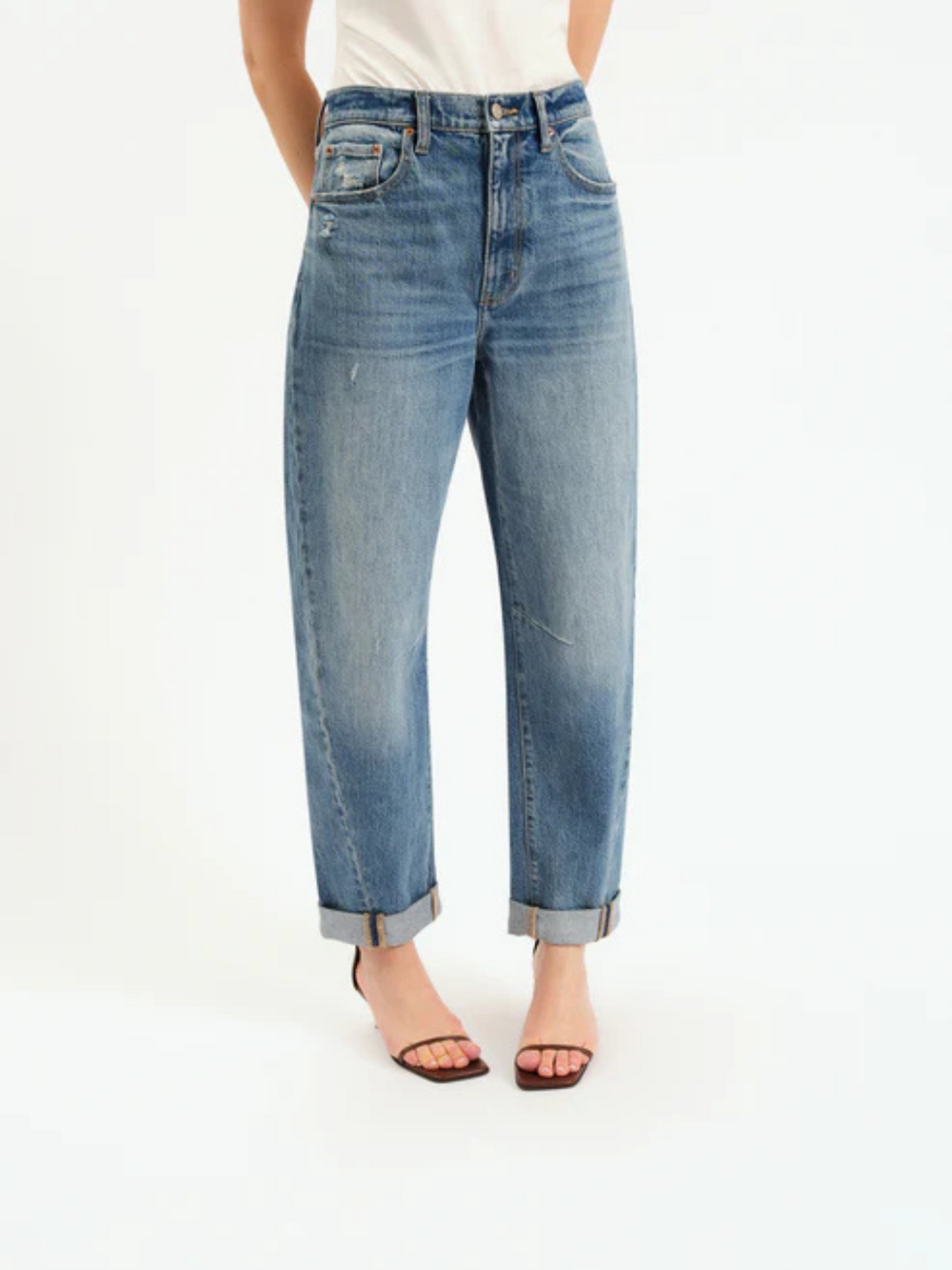 DAZE DENIM - Venice Barrel Leg jeans with high rise and pre-rolled cuffs on blue denim model.