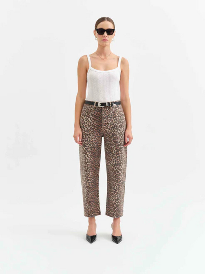Showcasing DAZE DENIM - Westward Barrel Leg Jeans with a bold cheetah print for a stylish, confident look.