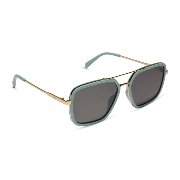 Square-framed sunglasses with gold metal arms and dark lenses on a white background.