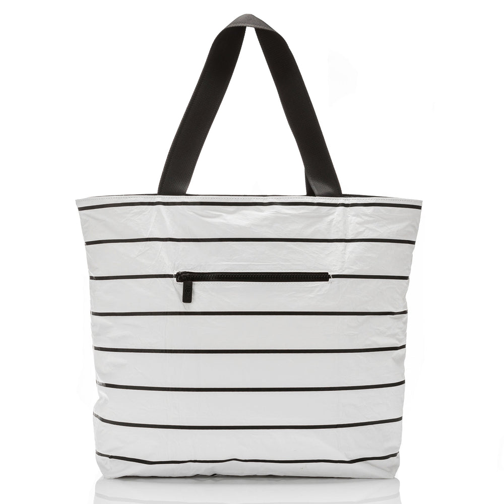 Back of the white and black Pinstripe Day Tripper tote showing the outside zipper pocket