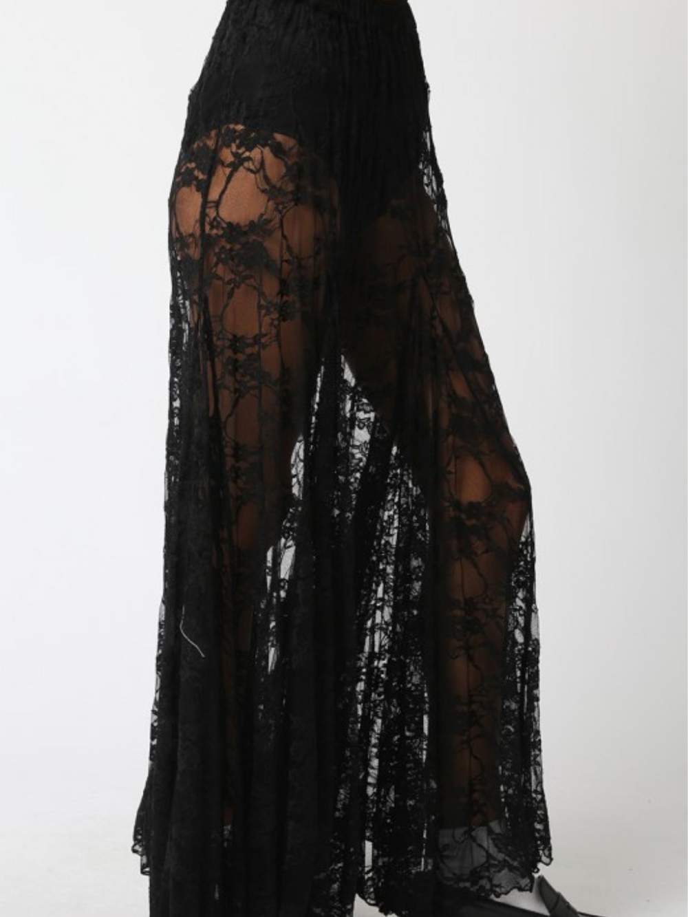 Diana Lace Skirt: black sheer floral lace maxi with relaxed fit and airy drape.