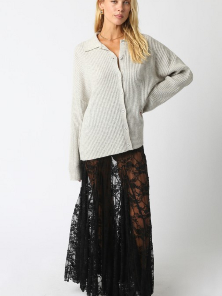 Diana Lace Skirt: sheer black floral lace maxi skirt with airy drape and relaxed fit.