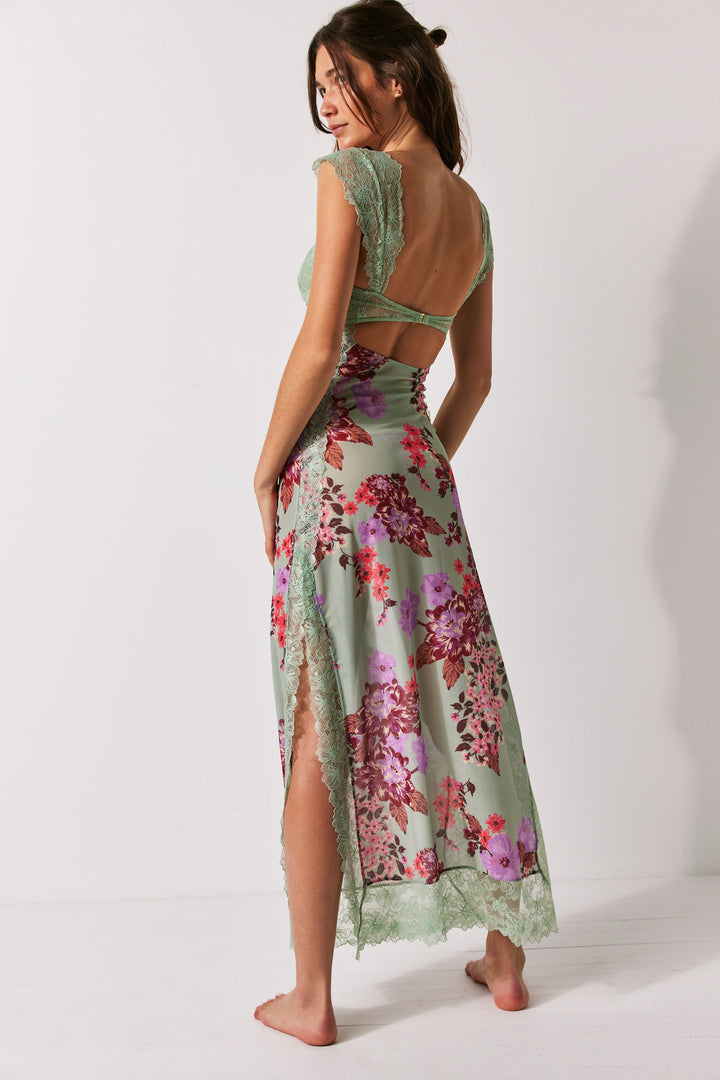 This maxi slip by Free People is femininity at its finest. The delicate lace bodice with capped sleeves and front cutout will turn heads wherever you go, while the mesh fabrication and lace trimming keep you feeling sassy and secure. Side slits add a dash of sultriness that can take you from day to night!
