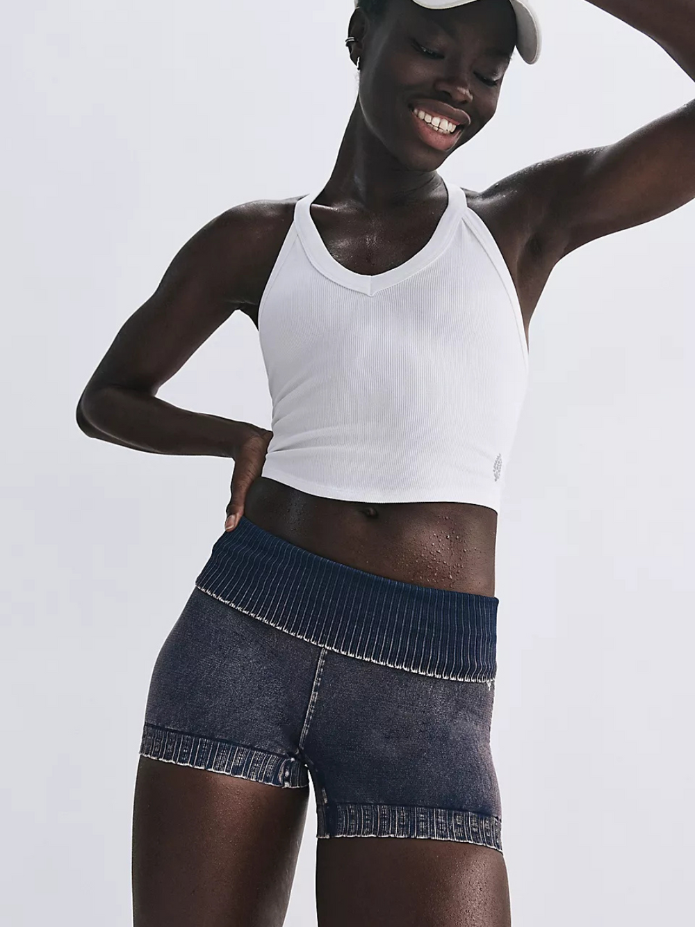 FREE PEOPLE - All Clear V-Neck Cami Top showcases a flattering design, perfect for layering and everyday comfort.