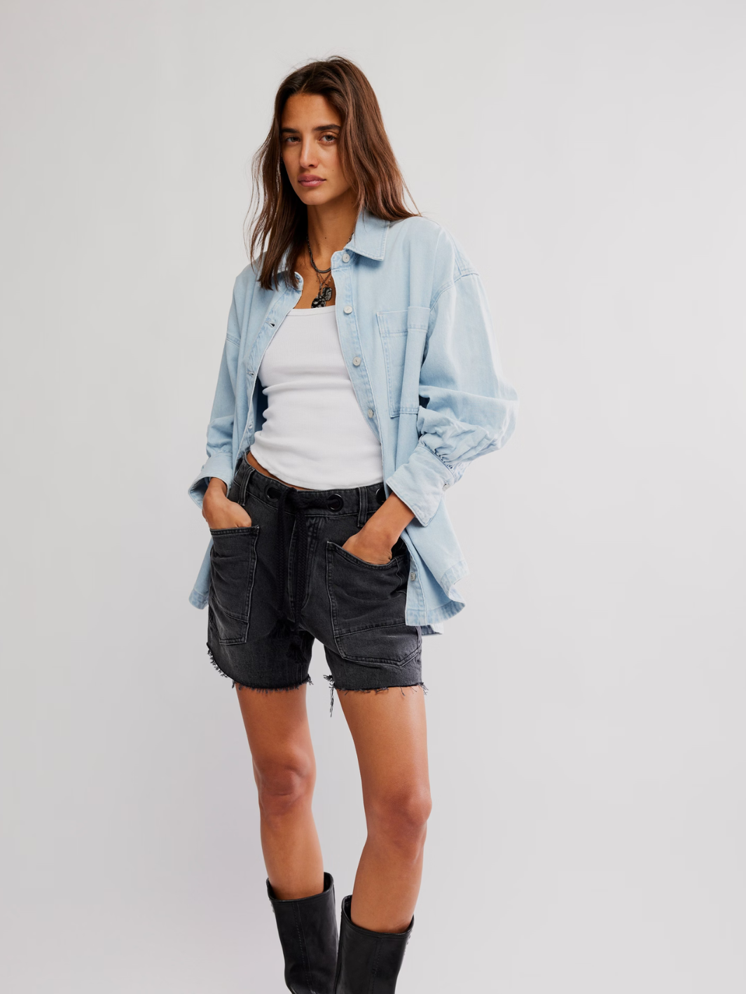 Effortlessly stylish, the FREE PEOPLE - Ashley Denim Shirt features an oversized fit perfect for casual layering.