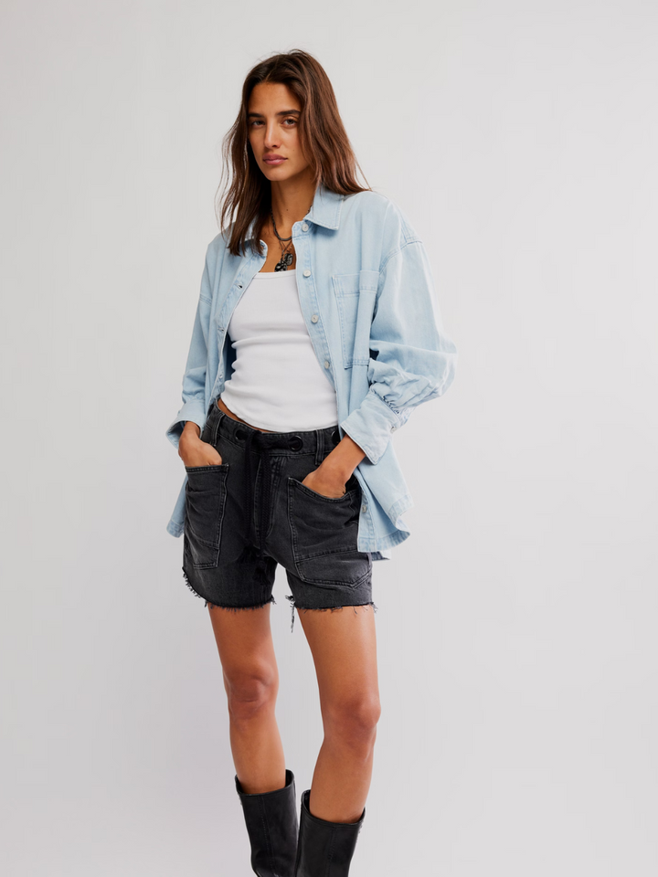 Effortlessly stylish, the FREE PEOPLE - Ashley Denim Shirt features an oversized fit perfect for casual layering.