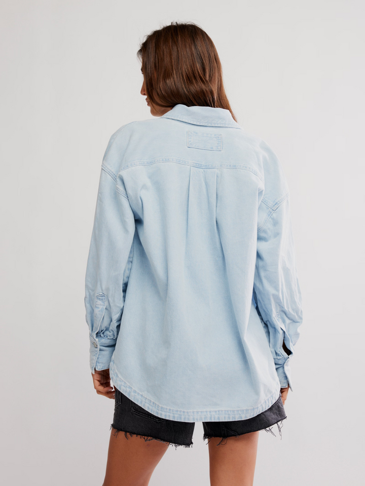 Elevate your style with the FREE PEOPLE - Ashley Denim Shirt, featuring an oversized fit perfect for any casual look.