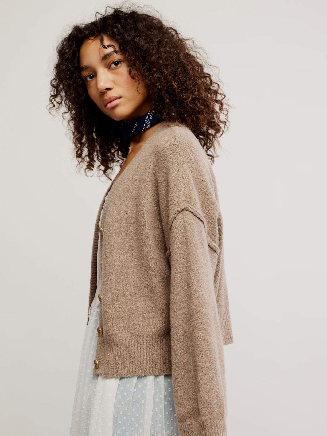 Cozy and oversized, the FREE PEOPLE - Cool of the Night Cardi is your go-to for effortless warmth and style.
