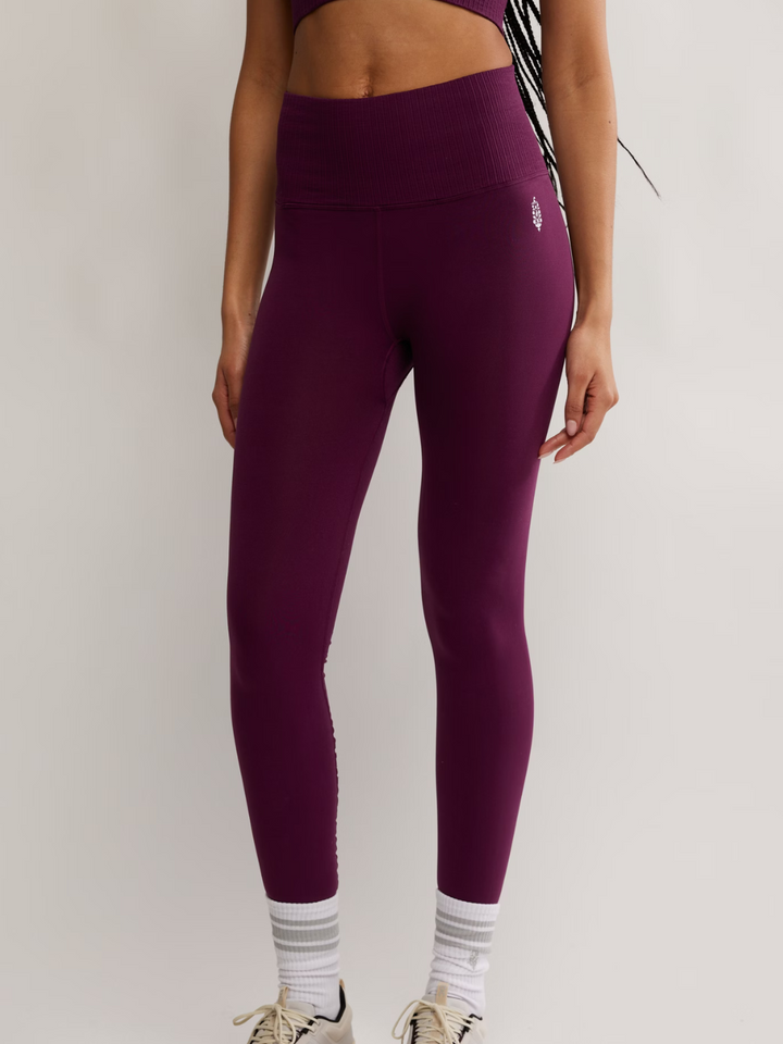 FREE PEOPLE - Good Karma Legging in rich plum, perfect for activewear from yoga to brunch. Lightweight and ultra-comfy.