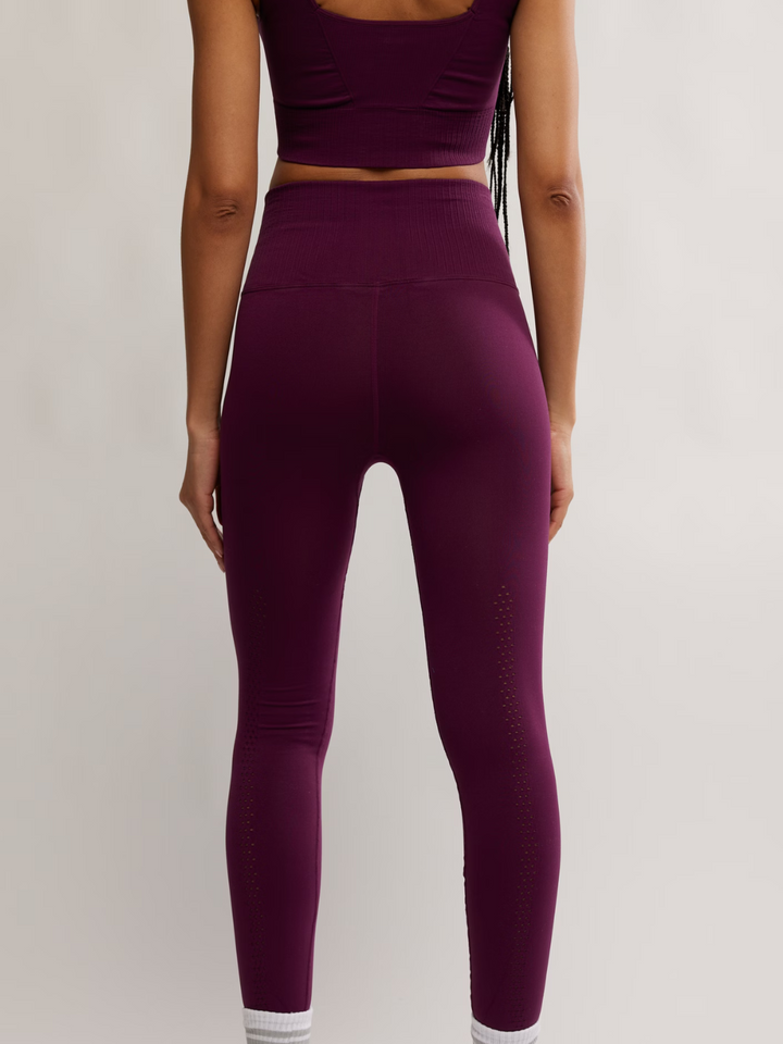 FREE PEOPLE - Good Karma Legging features a high-rise fit, perfect for activewear from yoga to brunch.