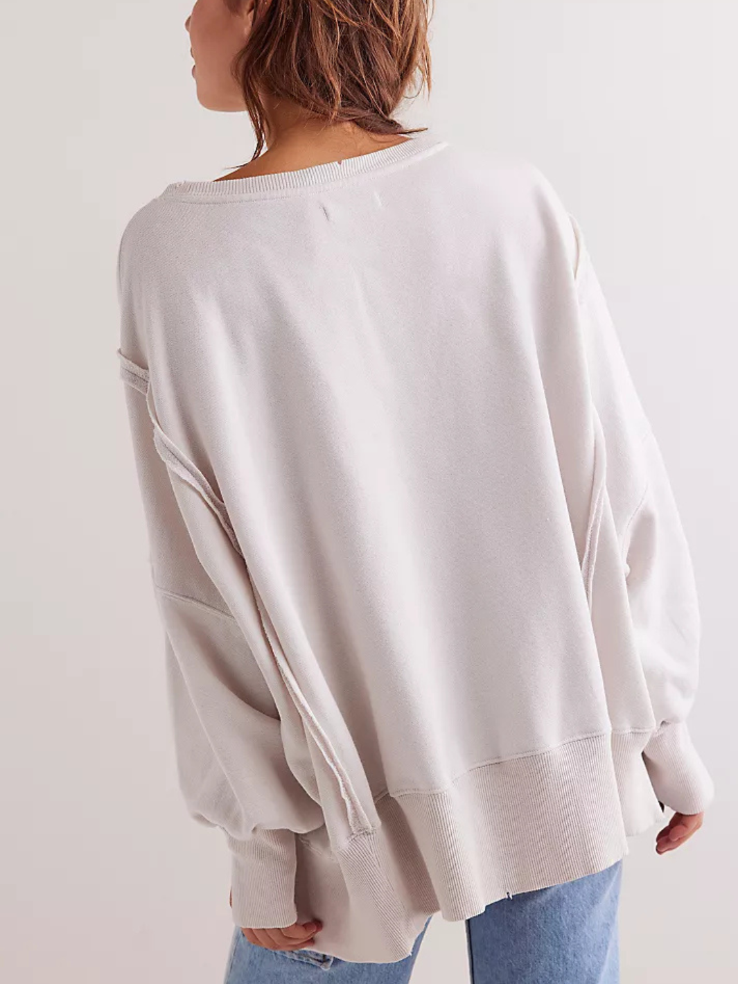 Relaxed silhouette of the FREE PEOPLE - Graphic Camden Highland Cow long sleeve, perfect for a vintage-inspired look.